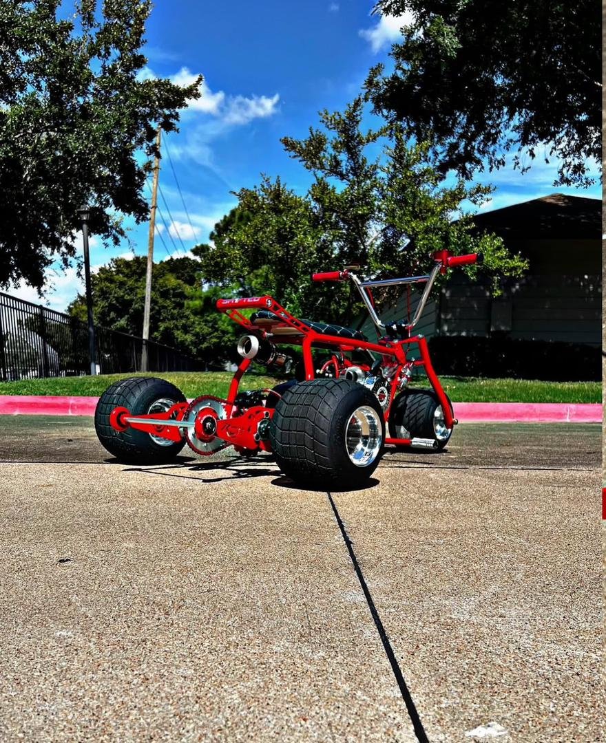 Illusion-Red-Ice-Mini-Trike-Platinum-Edition.jpeg Illusion Red Ice Mini Trike (Platinum Edition) - Image 1